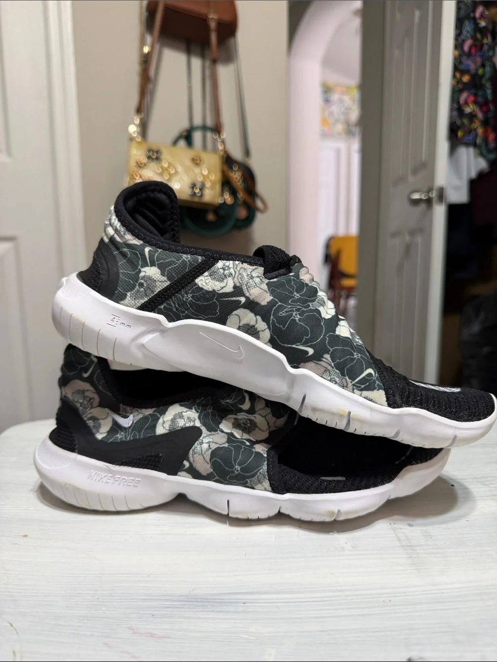 Nike Free RN Flyknit 3.0 sneakers in a black floral colorway size 8